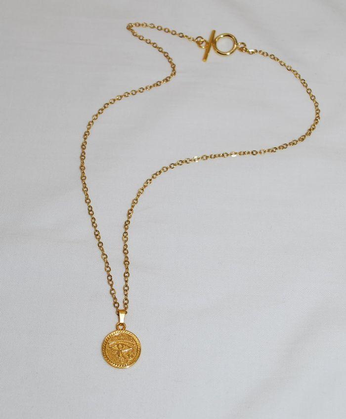 Collier avec pendentif oeil d'Horus en acier inoxydable doré - photo numéro 3