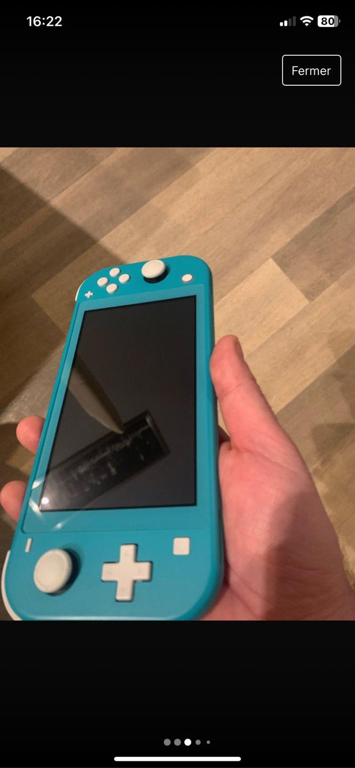 Switch lite original+jeux+rangement - photo numéro 3