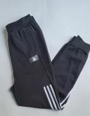 Jogging Adidas noir taille 15-16 ans en très bon état