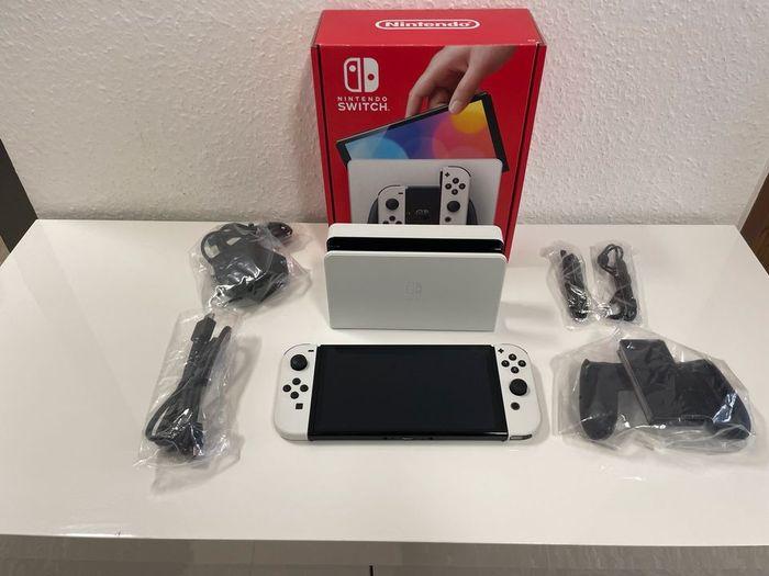 Nintendo Switch Oled Édition + 3 Jeux Switch/ Neuf + Accessoires - photo numéro 3