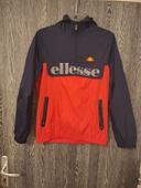 Veste coupe-vent ellesse unisexe bleu marine et rouge