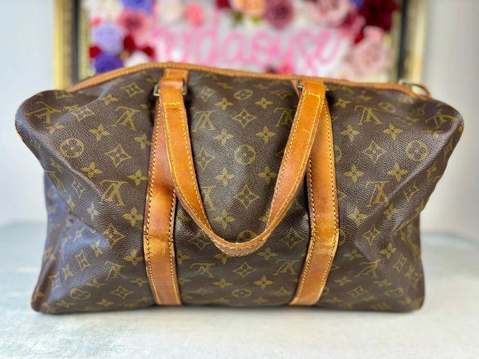 Sac de voyage souple Louis Vuitton - photo numéro 1