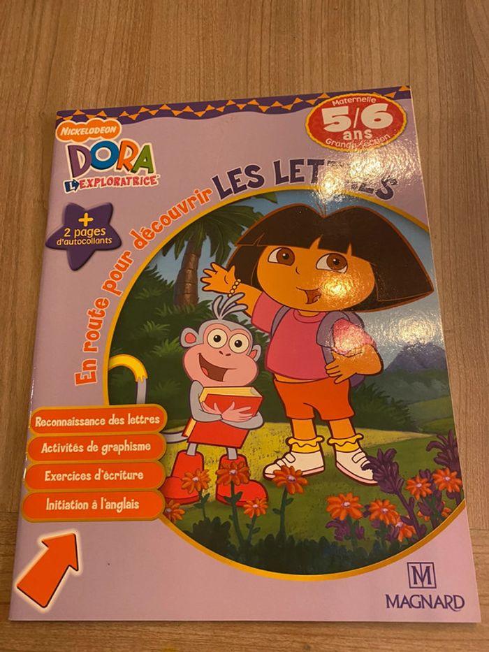 En route pour découvrir les lettres Dora GS Neuf avec toutes les gommettes - photo numéro 1