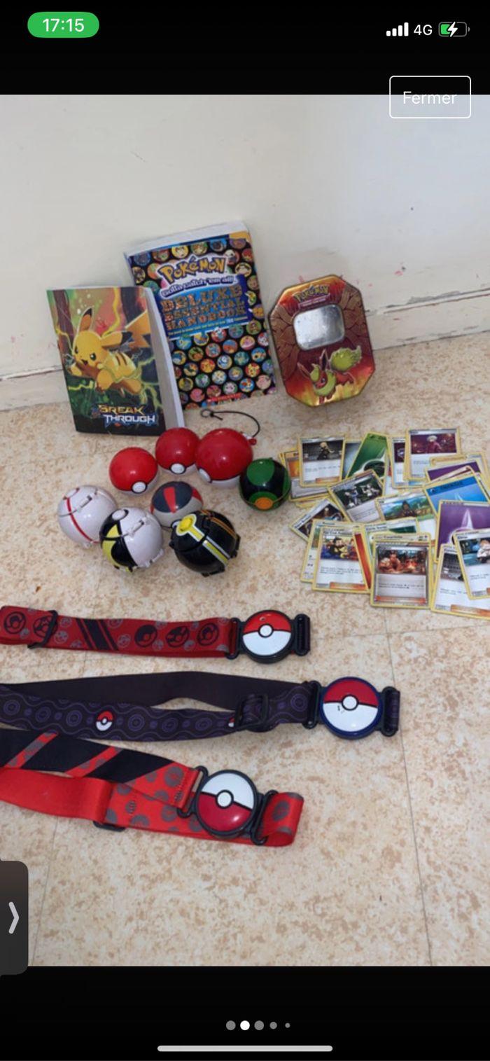 3 ceintures+ 1 carnet rangement cartes+8 poke ball +1 livre+ 50 cartes+ boîte en métal Pokemon - photo numéro 2