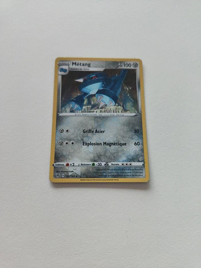 Metang 117/185 carte pokémon - photo numéro 1