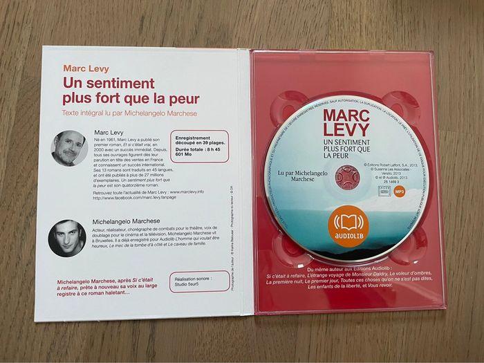 Livre audio Audiolib - Un sentiment plus fort que la peur - Marc Levy - photo numéro 2