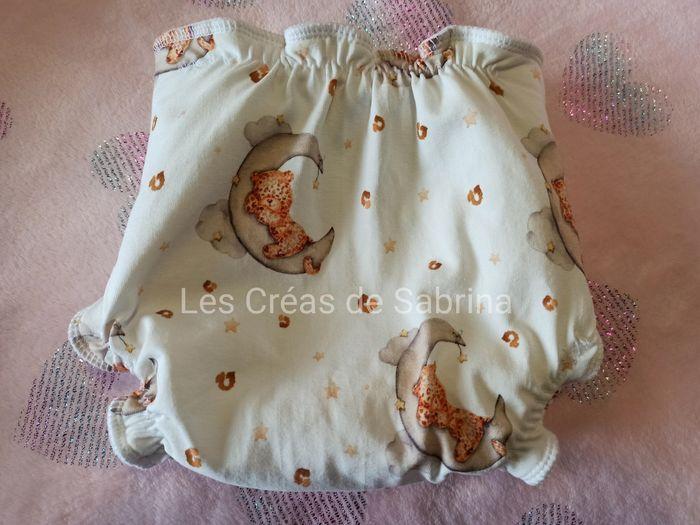 Couche classique, modèle Léopard endormi, taille unique 5-15kg - photo numéro 2