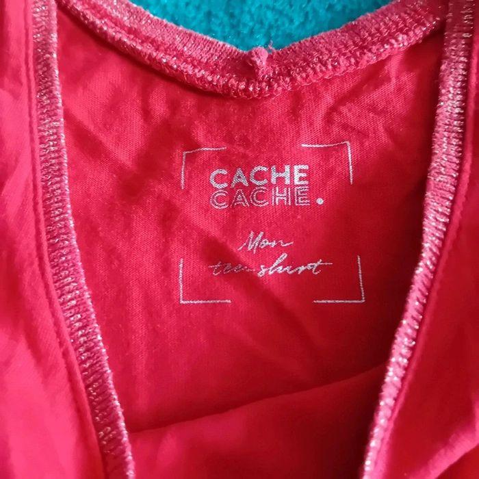 Débardeur rouge avec liseré doré sur le col taille 5 de chez Cache Cache - photo numéro 3