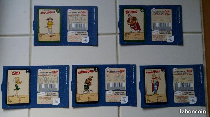 Lot cartes + timbres asterix le village en fête chez U Jeu de 7 familles