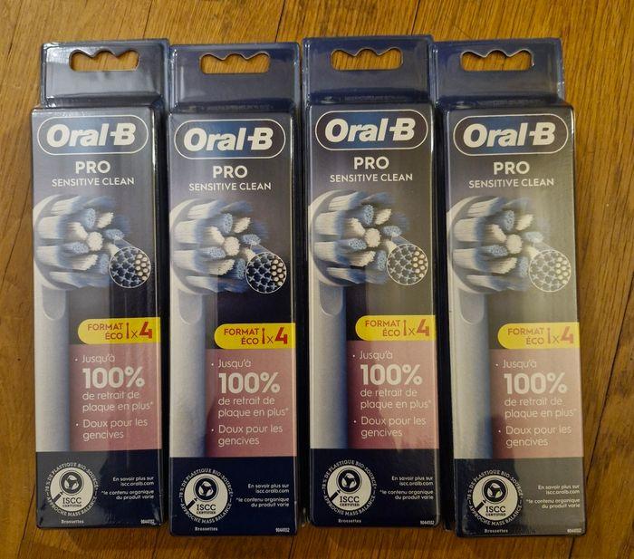 4 paquets de brossettes Oral B - photo numéro 1