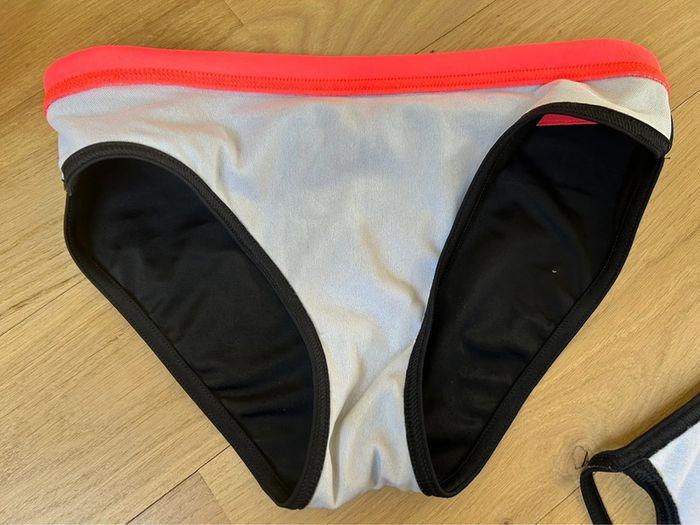 Maillot de bain coupe sportive brassière culotte noir et rose fluo - photo numéro 10