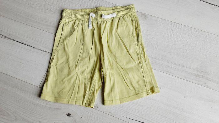 Vêtement mixte garçon fille short bermuda jaune Kiabi 8 ans - photo numéro 1