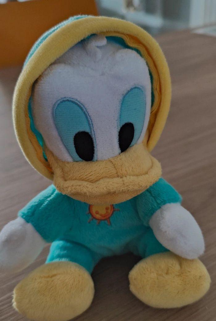 Peluche Donald en grenouillère bleue - photo numéro 8