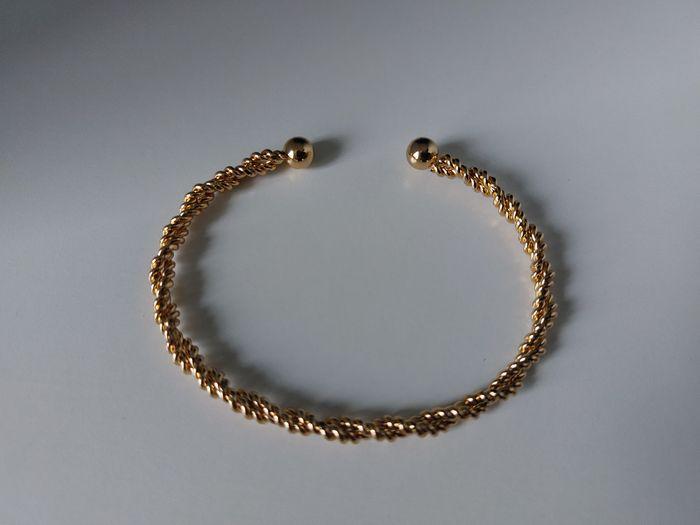 Bracelet fantaisie jonc doré torsadé - photo numéro 1