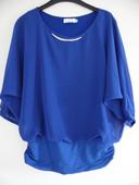 Blouse bleue, taille 38.