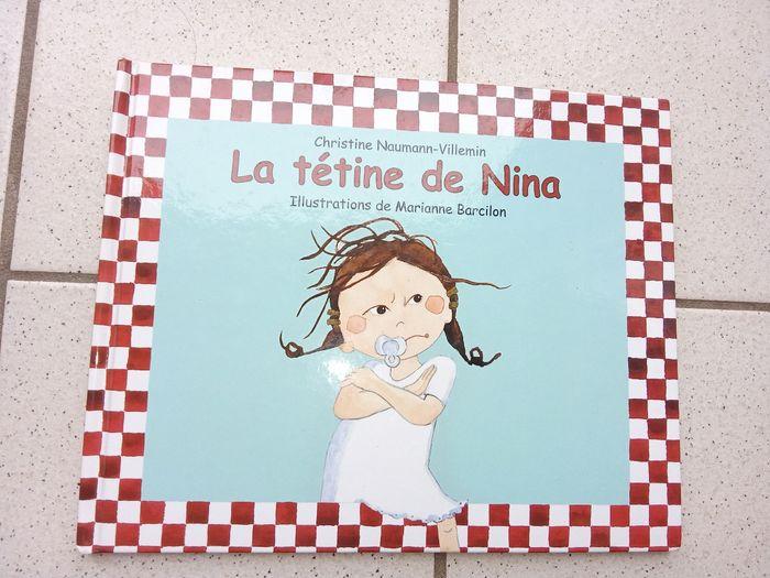 Livre école des loisirs la tétine de Nina, histoire enfant, petite fille, loup, tétine, couverture rigide numéro 1 - photo numéro 1