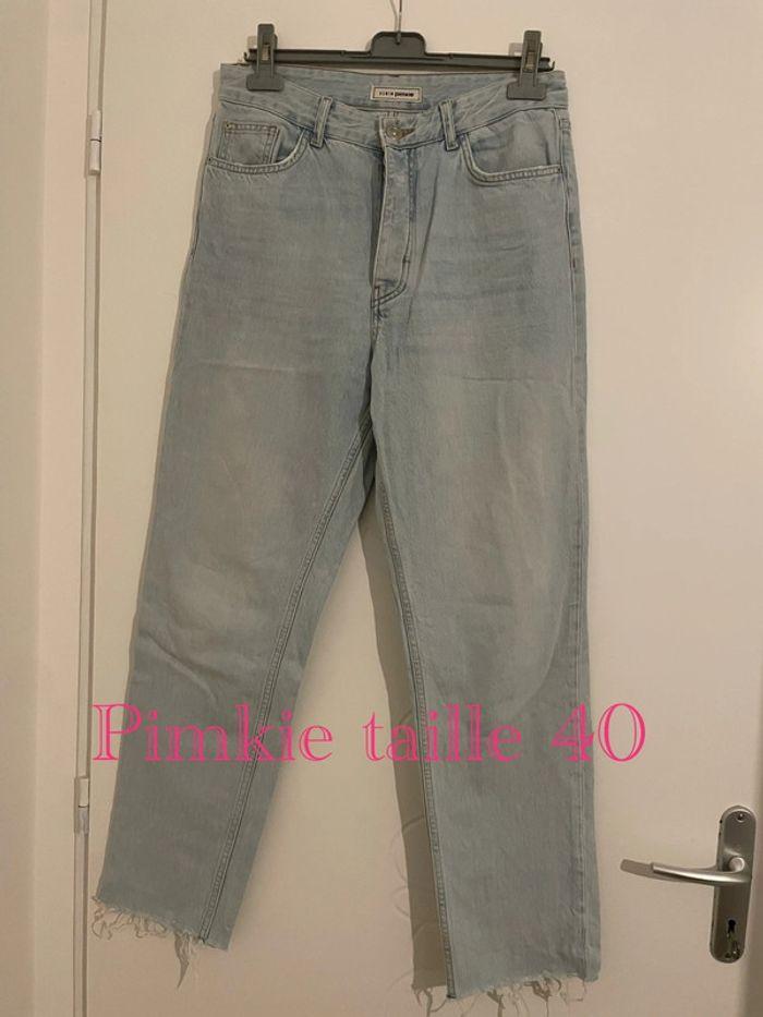 Jean bleu clair taille haute coupe flare jambe large bas frange pimkie taille 40 - photo numéro 1