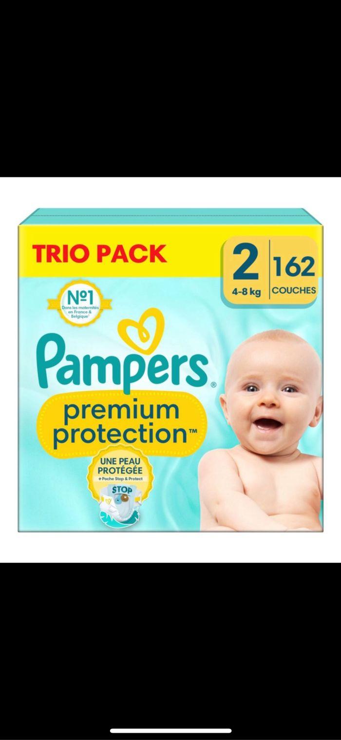 1 carton de couches Pampers taille 2