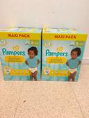 Deux maxi carton couche Pampers