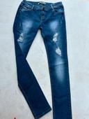 Jean skinny taille basse bleu à trous