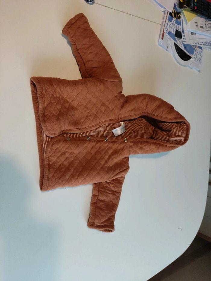 Gilet à capuche