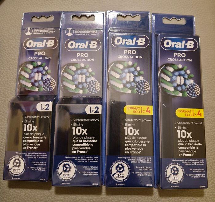 4 paquets de brossettes Oral B - photo numéro 1