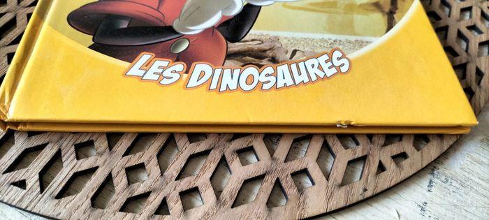 Livre le monde merveilleux de la connaissance Disney les dinosaures - photo numéro 2