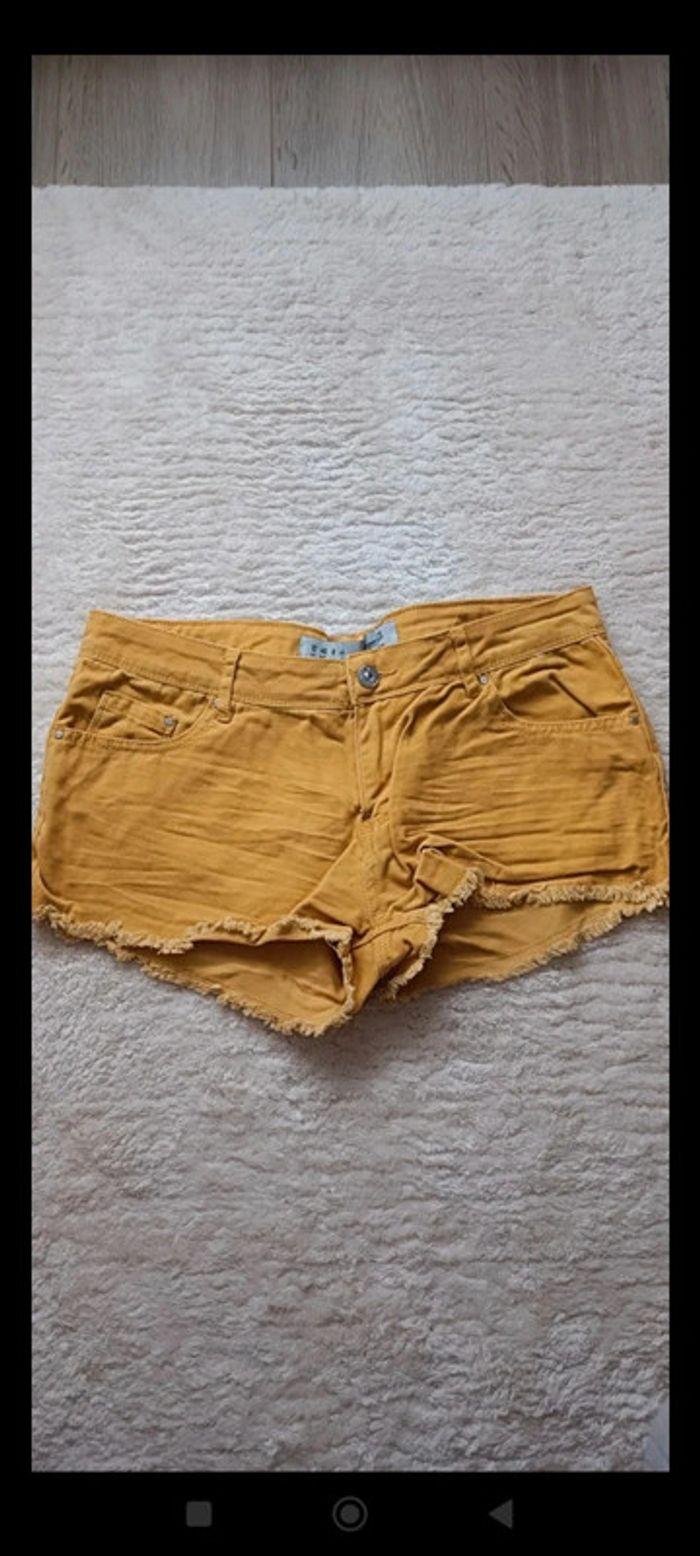 Short en jeans moutarde Primark taille 40 - photo numéro 1