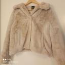 Manteau en fourrure beige