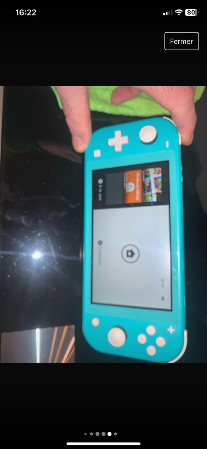 Switch lite original+jeux+rangement - photo numéro 6