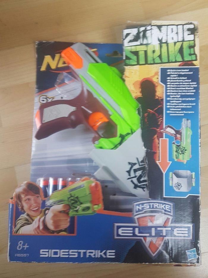 Nerf Zombie Strike + rangement ceinture + 8 fléchettes. - photo numéro 1