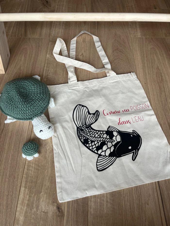 Tote bag Vomme un poisson dans l’eau