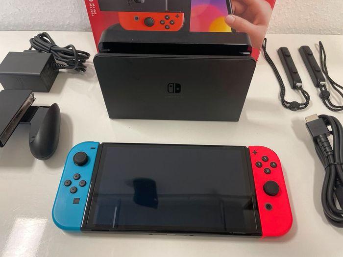 Nintendo Switch OLED Édition (Neuf ) avec jeux et accessoires - photo numéro 7