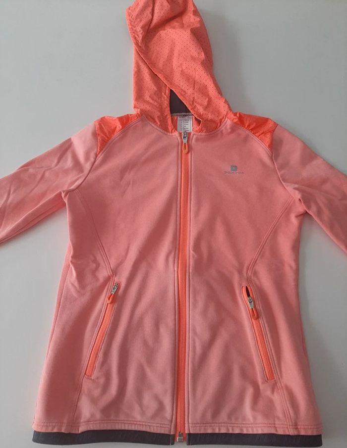 Vestes coupe-vent Decathlon corail taille 10 ans / 140 cm - photo numéro 1