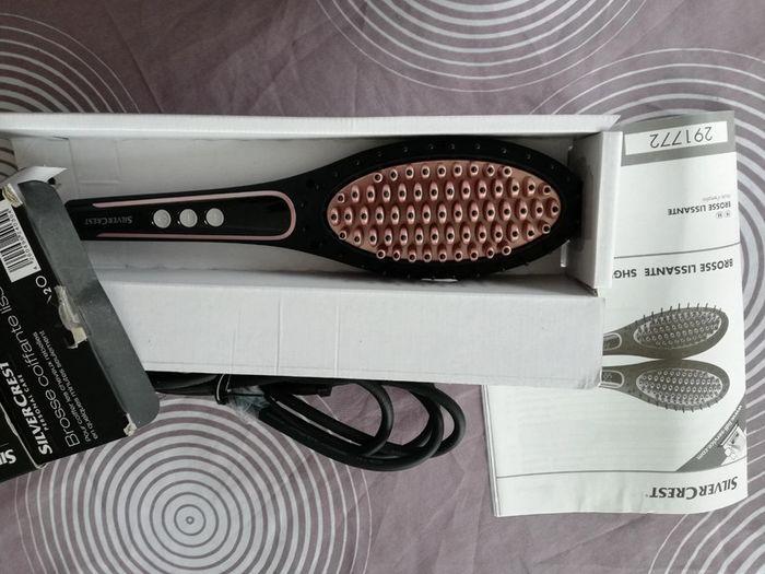 Brosse coiffante lissante neuve - photo numéro 7