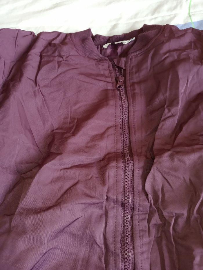 Blouson manteau prune name it 14 ans
En très bon état - photo numéro 2