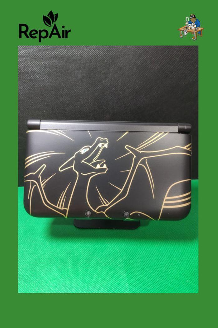 Nintendo 3DS XL - Coques Pokémon Dracaufeu - 128Go - Très bon état - photo numéro 1