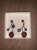 1 Paire de boucles d’oreilles