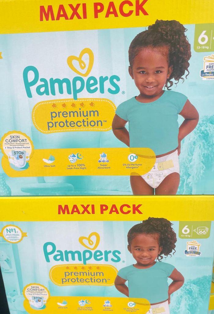 2 paquets de couches Pampers taille 6