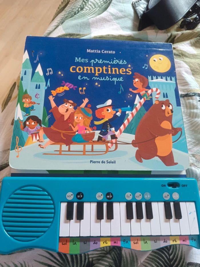 Livre "Mes premières comptines en musique" avec piano - photo numéro 1