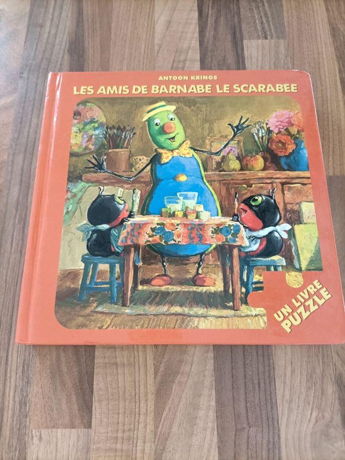 Lot 8 puzzles dans un livre - photo numéro 1