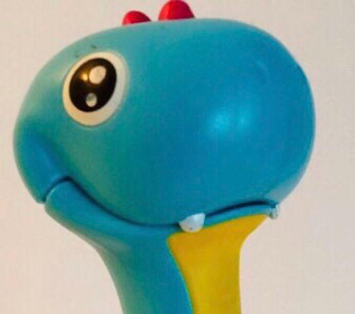 Tomy Agito Dino dinosaure sonore interactif hochet sensoriel dès 6 mois lot SOP77 - photo numéro 1