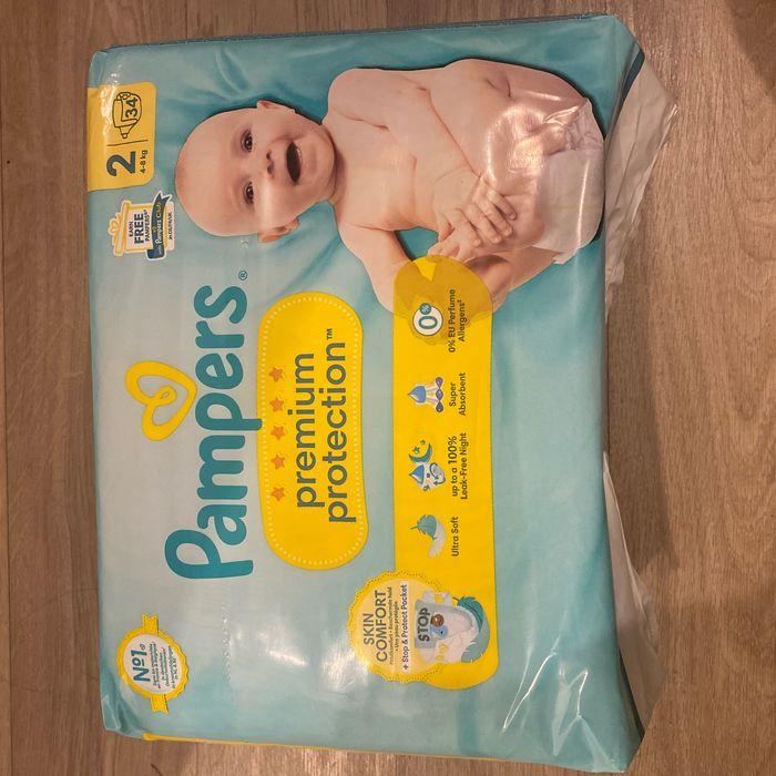 Couches Pampers premium protection