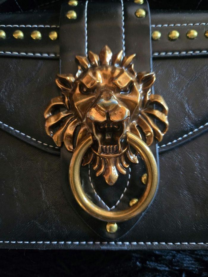 Sac noir avec tête de lion doré - photo numéro 2