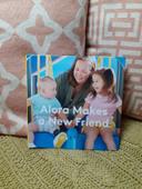 Book " Alora makes a new friend" from Lovevery