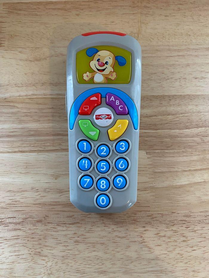 Fisher-Price Jouet D’Éveil Musical La Télécommande De Puppy Rires & Éveil, Version FR - photo numéro 1