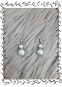 Jolies boucles d'oreilles perle