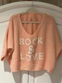 Pull Oversize rose pâle col V