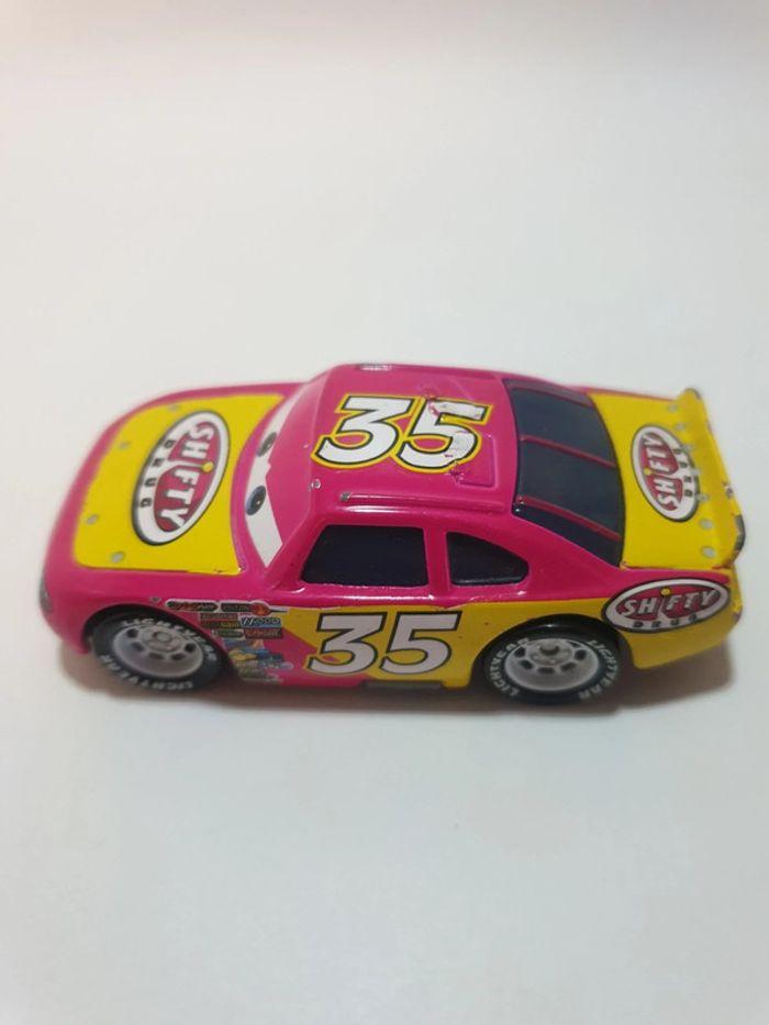 Mattel Voiture Cars Disney/Pixar Kevin racingtire Shifty Drug n°35 Rose/Jaune - 1/55 - photo numéro 11