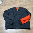 Veste Bombers, réversible, noire et orange par Louis Marie de Castelbajac taille L